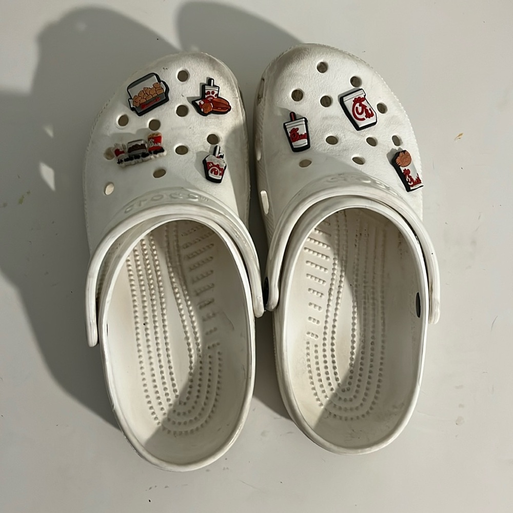 White crocs with jib its